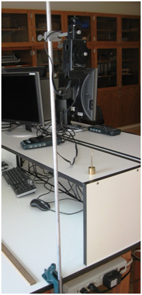 The testing apparatus is set up near a computer work station.