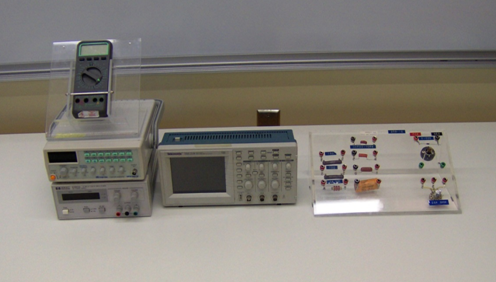 The required apparatus, an oscilloscope, a function generator, a power supply, a multimeter and a circuit box.